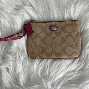 Coach wristlet. Pink and brown
